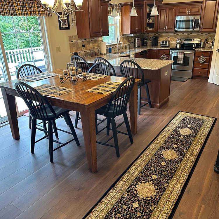 Area rug beside table