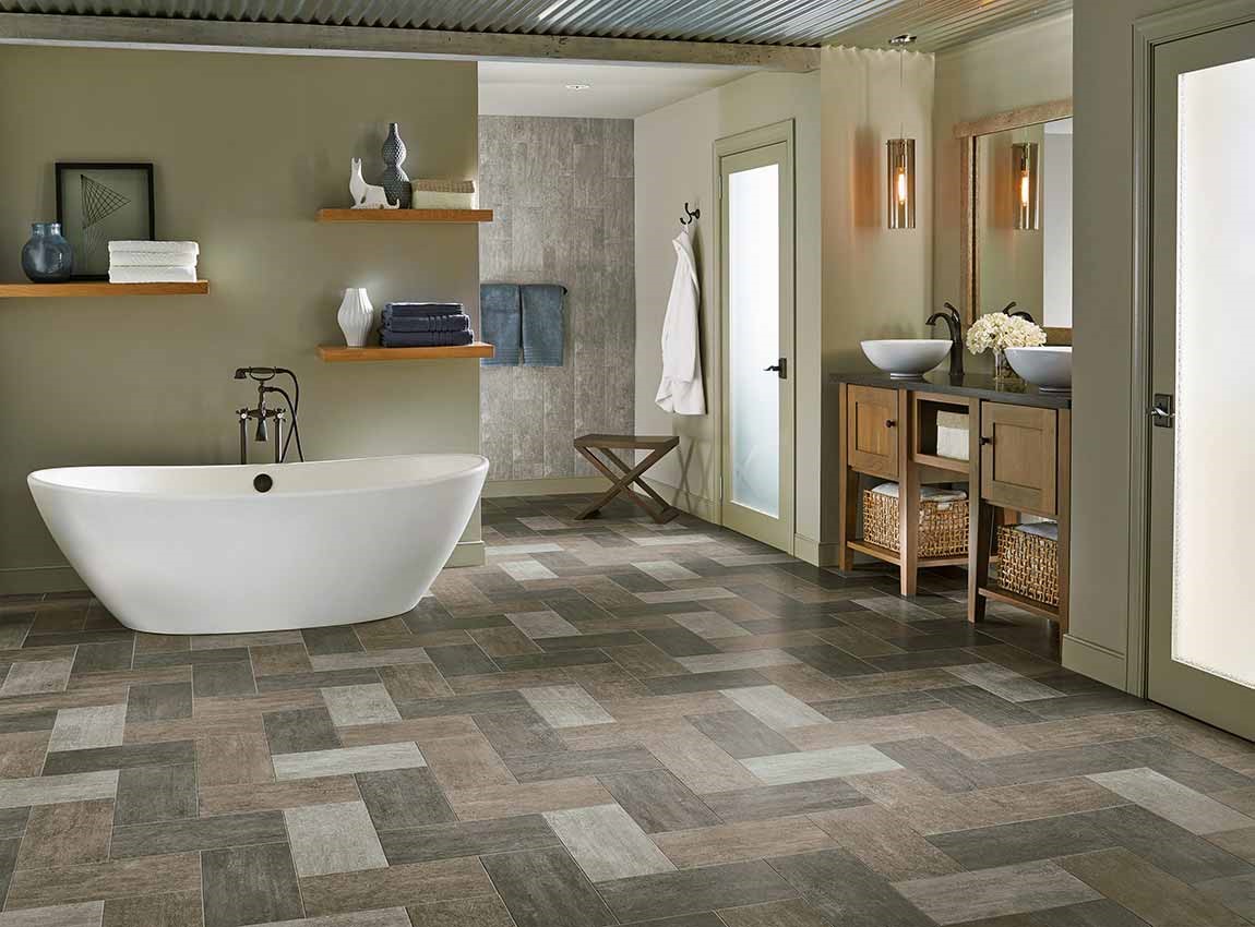 bathroom with pattern tiled flooring and standalone tub bathroom with pattern tiled flooring and standalone tub